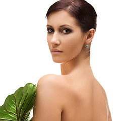 Image showing woman with green leaf