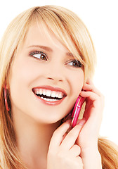 Image showing happy girl with pink phone