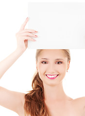 Image showing happy girl with blank board