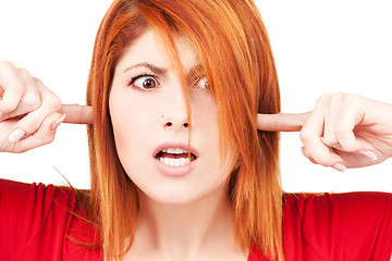 Image showing unhappy redhead woman