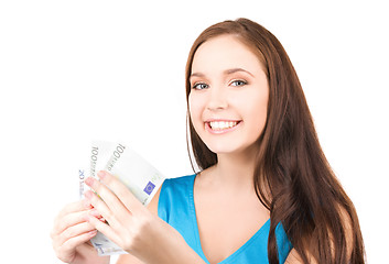 Image showing lovely teenage girl with money