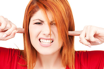 Image showing unhappy redhead woman