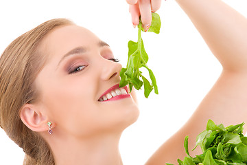 Image showing happy woman with spinach