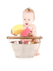 Image showing baby boy with sponges