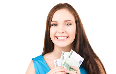 Image showing lovely teenage girl with money