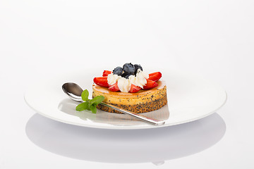 Image showing Cheese-cake, strawberry and blueberry