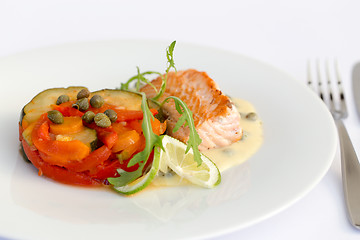 Image showing Fish fillet, sauce and vegetables