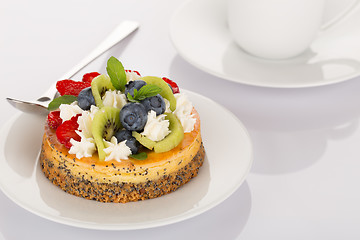 Image showing Cheese-cake, strawberry, blueberry and kiwi