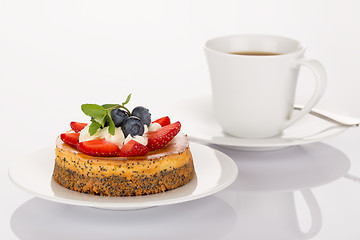 Image showing Cheesecake, cup of coffee and spoon