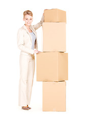 Image showing businesswoman with boxes