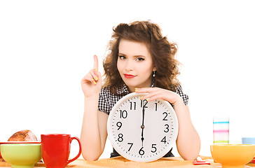 Image showing young attractive woman in the kitchen