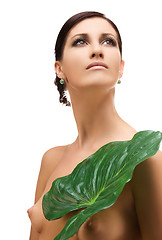 Image showing woman with green leaf