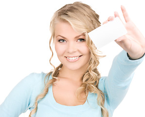 Image showing happy girl with business card