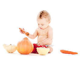 Image showing baby boy with vegetables