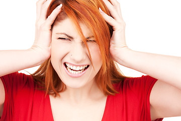 Image showing unhappy redhead woman