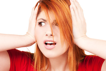 Image showing unhappy redhead woman