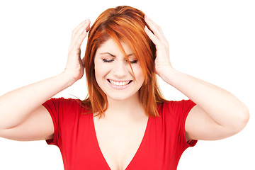 Image showing unhappy redhead woman