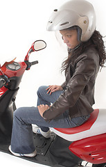 Image showing woman riding scooter