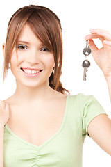 Image showing happy teenage girl with keys