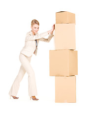 Image showing businesswoman with boxes