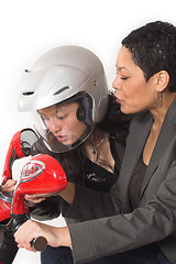 Image showing couple girls talking on  scooter