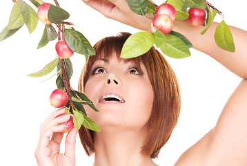 Image showing happy woman with apple twig
