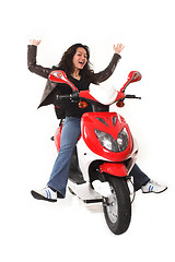 Image showing woman riding electric scooter with no helmet