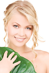 Image showing woman with green leaf