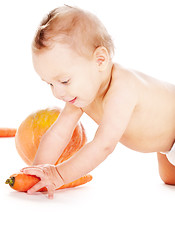 Image showing baby boy with vegetables