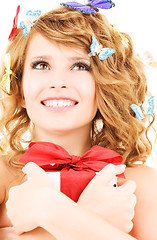 Image showing butterfly girl with gift