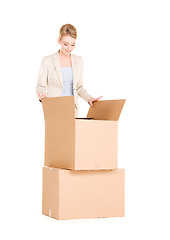 Image showing businesswoman with boxes