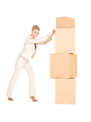 Image showing businesswoman with boxes