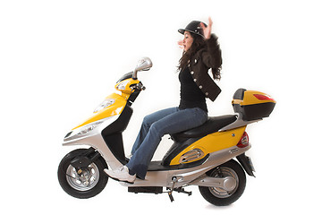 Image showing girl almost falling over a scooter