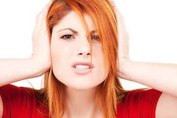 Image showing unhappy redhead woman