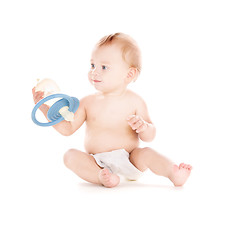 Image showing baby boy with big pacifier