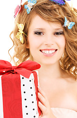 Image showing butterfly girl with gift