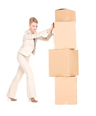 Image showing businesswoman with boxes