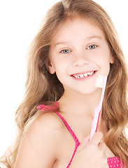 Image showing happy girl with toothbrush