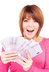 Image showing happy woman with money