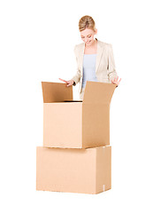 Image showing businesswoman with boxes