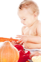 Image showing baby boy with vegetables