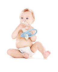 Image showing baby boy with big pacifier