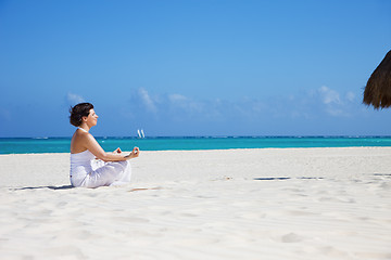 Image showing meditation on the beach
