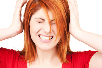 Image showing unhappy redhead woman