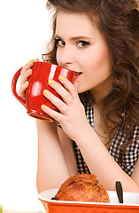 Image showing young attractive woman in the kitchen