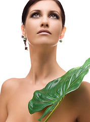 Image showing woman with green leaf