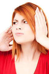 Image showing unhappy redhead woman