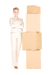 Image showing businesswoman with boxes