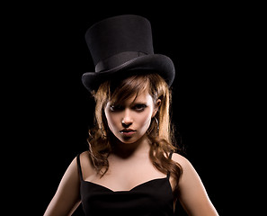 Image showing woman in black dress and top hat