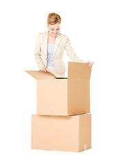 Image showing businesswoman with boxes